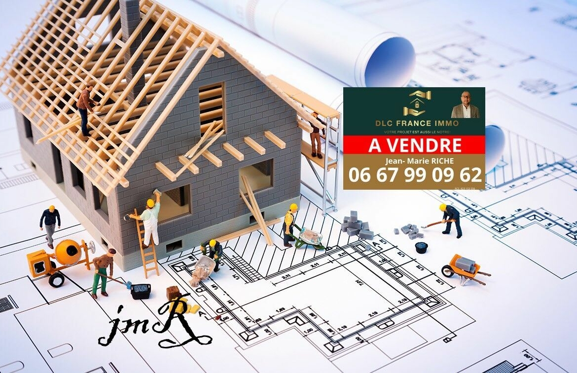 building house on blueprints with worker - construction project
